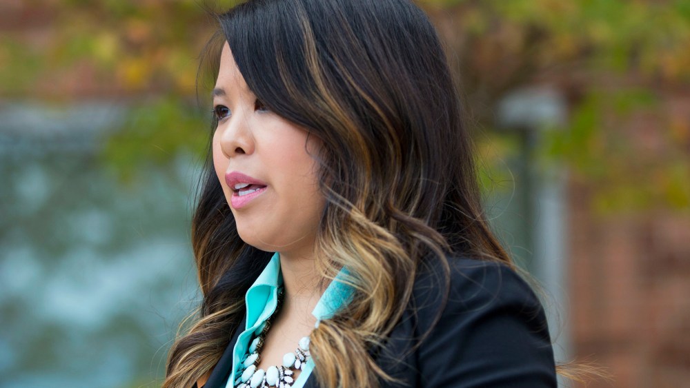Nina Pham speaks outside of National Institutes of Health (NIH) in Bethesda, Md., Oct. 24, 2014. (Photo by Pablo Martinez Monsivais/AP)