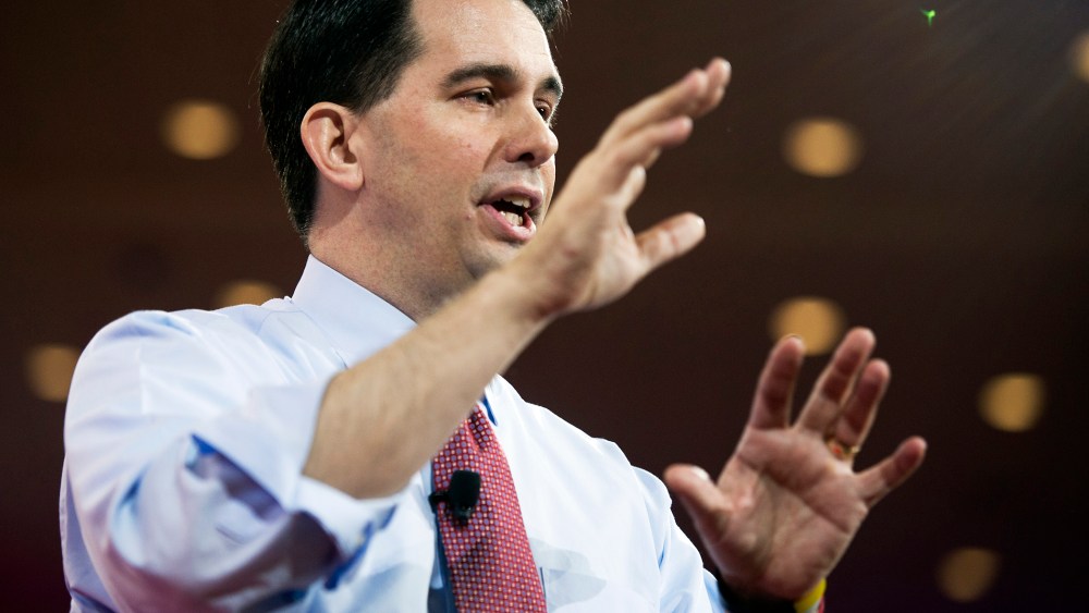 Wisconsin Gov. Scott Walker gestures while speaking during the Conservative Political Action Conference (CPAC) in National Harbor, Md. on Feb. 26, 2015. (Photo by Cliff Owen/AP)