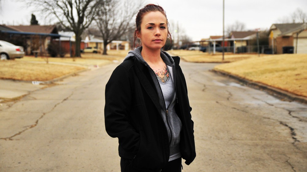 Tina Wilson, who was a victim of sexual assault while serving in the Navy, outside of her brothers home in Del City, OK.