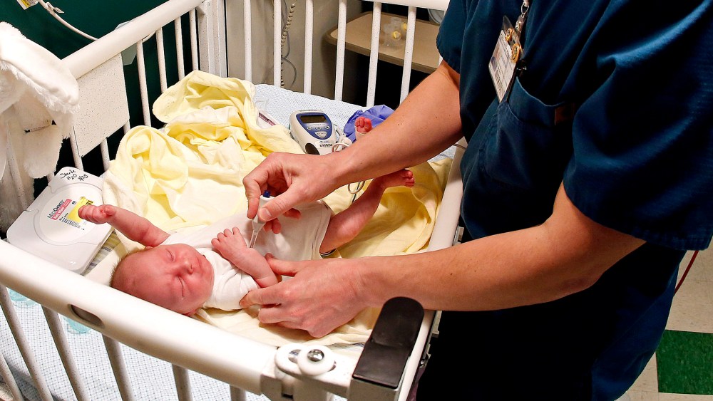A nurse at East Tennessee Children's Hospital in Knoxville, Tenn., gives medication to Baby Liam, who was born dependent on drugs, Mar. 29, 2013.