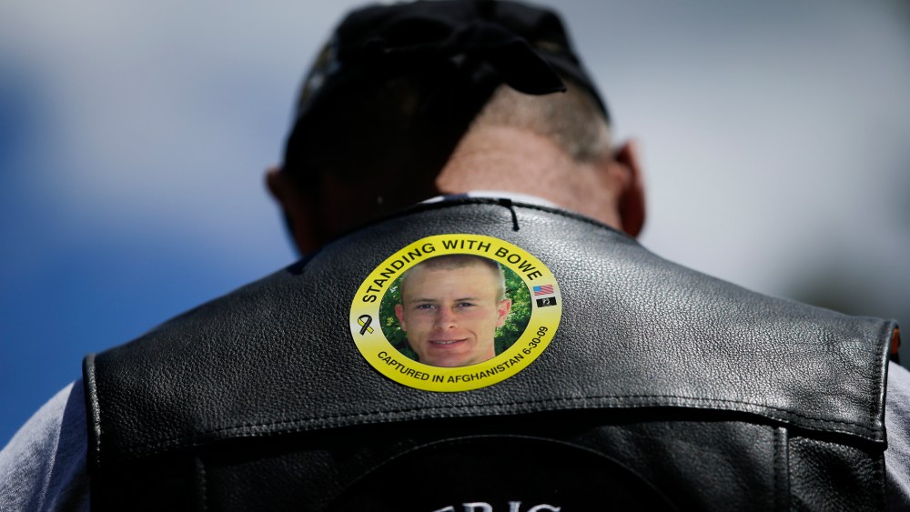 In this Saturday, June 22, 2013 file photo, Gulf War veteran Ron Coumerilh wears a sticker to support captive U.S. Army Sgt. Bowe Bergdahl at the "Bring Bowe Back" celebration in Hailey, Idaho.