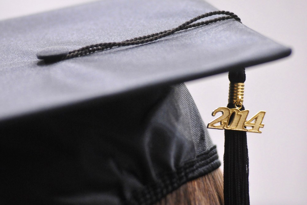 Tassels hang from a cap during commencement exercises on May 9, 2014.