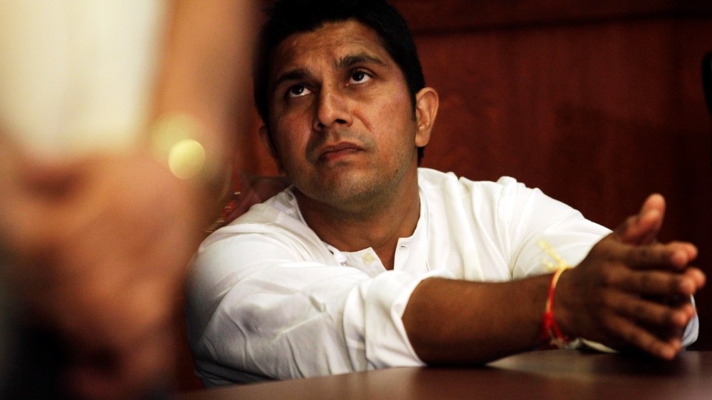 Amardeep Kaleka, son of the president of Sikh Temple of Wisconsin Satwant Kaleka, watches a news conference, Monday, Aug. 6, 2012, in Oak Creek, Wisconsin.