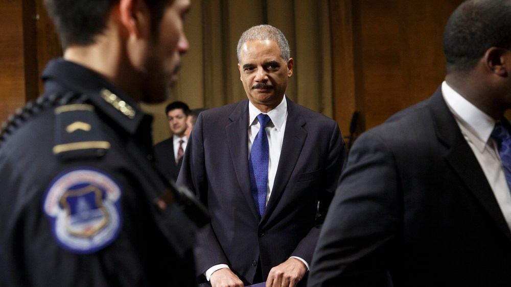 Attorney General Eric Holder arrives to testify before the Senate Judiciary Committee, Jan. 29, 2014.