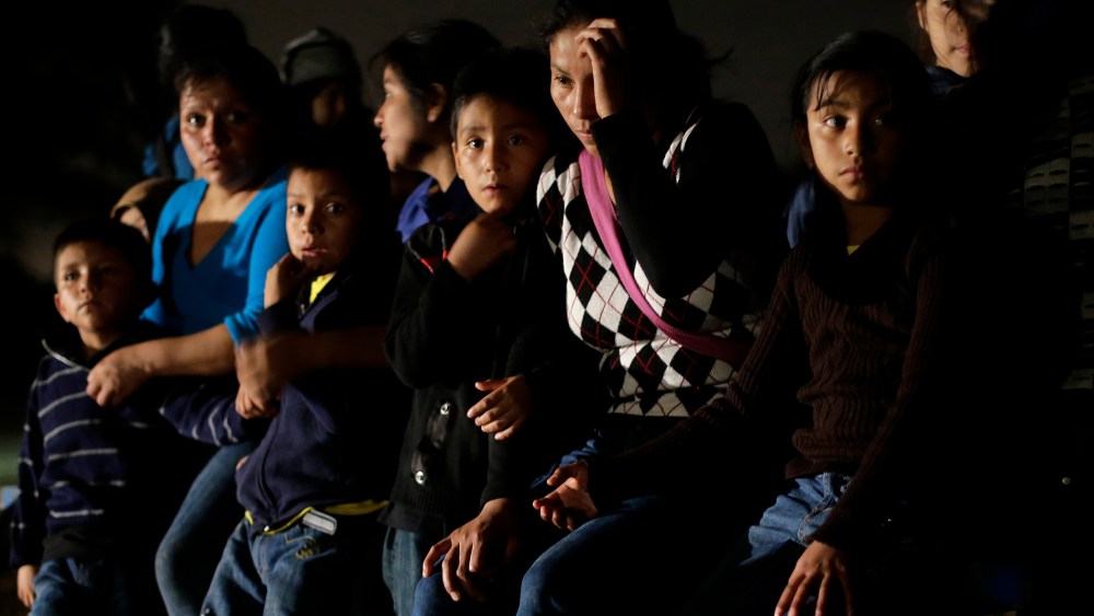 A group of undocumented immigrants from Honduras and El Salvador who crossed the U.S.-Mexico border are stopped in Granjeno, Texas on June 25, 2014.