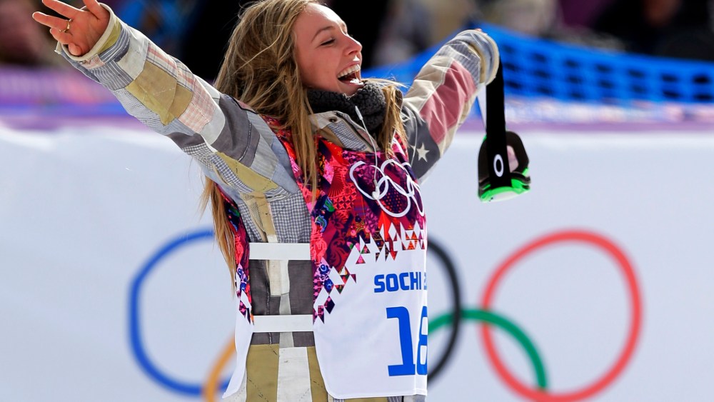 American Jamie Anderson celebrates after winning the women's snowboard slopestyle final at the 2014 Winter Olympics, Feb. 9, 2014, in Krasnaya Polyana, Russia.