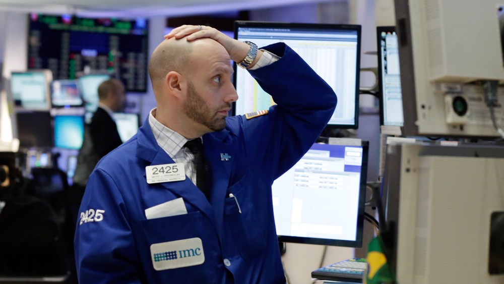 Specialist Meric Greenbaum works on the floor of the New York Stock Exchange, Jan. 4, 2016. U.S. stocks are opening 2016 on a grim note, dropping sharply after a plunge in China and declines in Europe. (Photo by Richard Drew/AP)