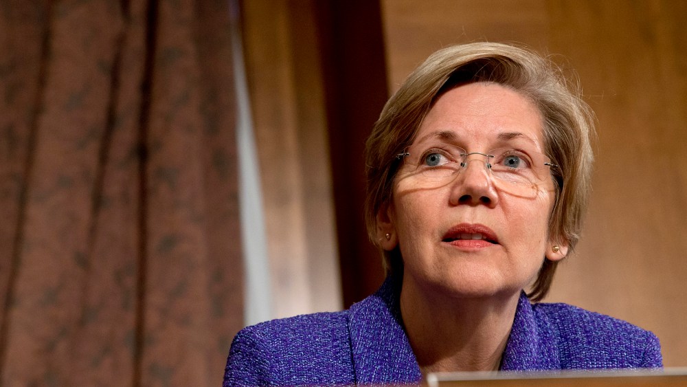 Senate Banking Committee member Sen. Elizabeth Warren listens to testimony on Capitol Hill in Washington on Nov. 12, 2013. (Jacquelyn Martin/AP)