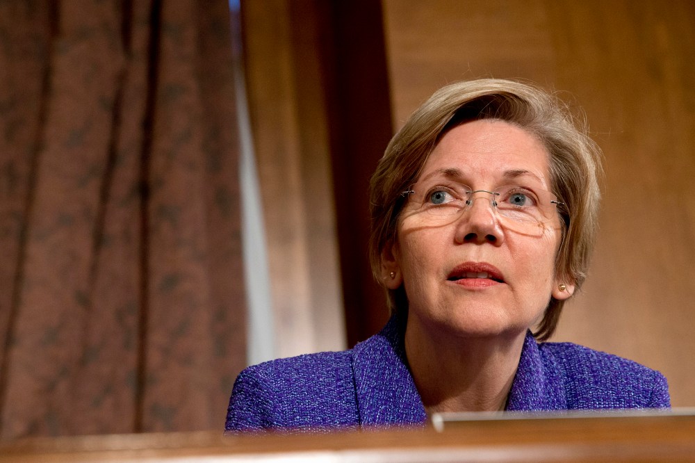 Senate Banking Committee member Sen. Elizabeth Warren listens to testimony on Capitol Hill in Washington on Nov. 12, 2013. (Jacquelyn Martin/AP)