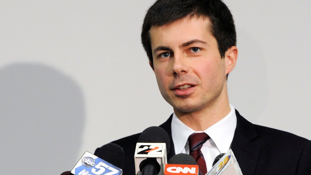 In this March 18, 2013 file photo, South Bend Mayor Peter Buttigieg speaks to reporters about a plane crash in South Bend, Ind. (Photo by Joe Raymond/AP)