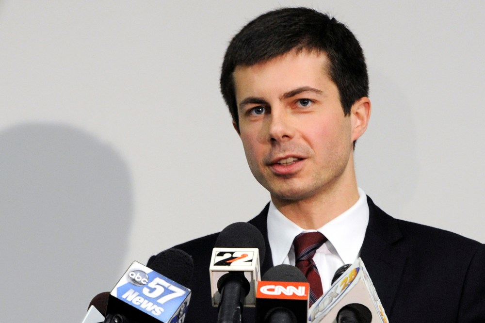In this March 18, 2013 file photo, South Bend Mayor Peter Buttigieg speaks to reporters about a plane crash in South Bend, Ind. (Photo by Joe Raymond/AP)