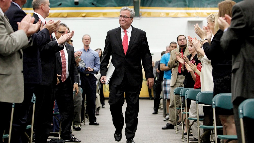Jeb Bush is greeted with a standing ovation in the Marion Bowman Activities Center at Saint Leo University, following his introduction before his speech "Leading in a Climate of Change", June 3, 2015. (Photo by Brendan Fitterer/Tampa Bay Times/AP)