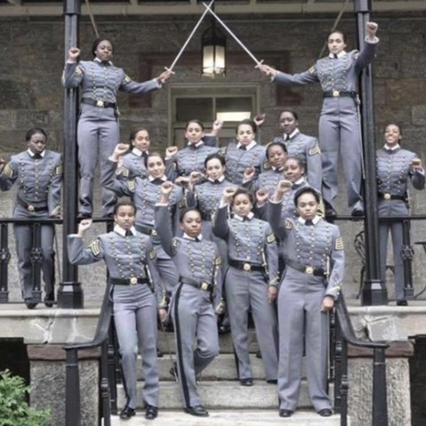 This undated image obtained from Twitter on May 7, 2016 shows 16 black, female cadets in uniform with their fists raised while posing for a photograph at the United States Military Academy at West Point, N.Y. (Photo obtained from Twitter/AP)