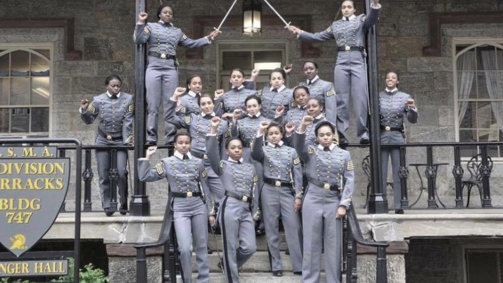 This undated image obtained from Twitter on May 7, 2016 shows 16 black, female cadets in uniform with their fists raised while posing for a photograph at the United States Military Academy at West Point, N.Y. (Photo obtained from Twitter/AP)