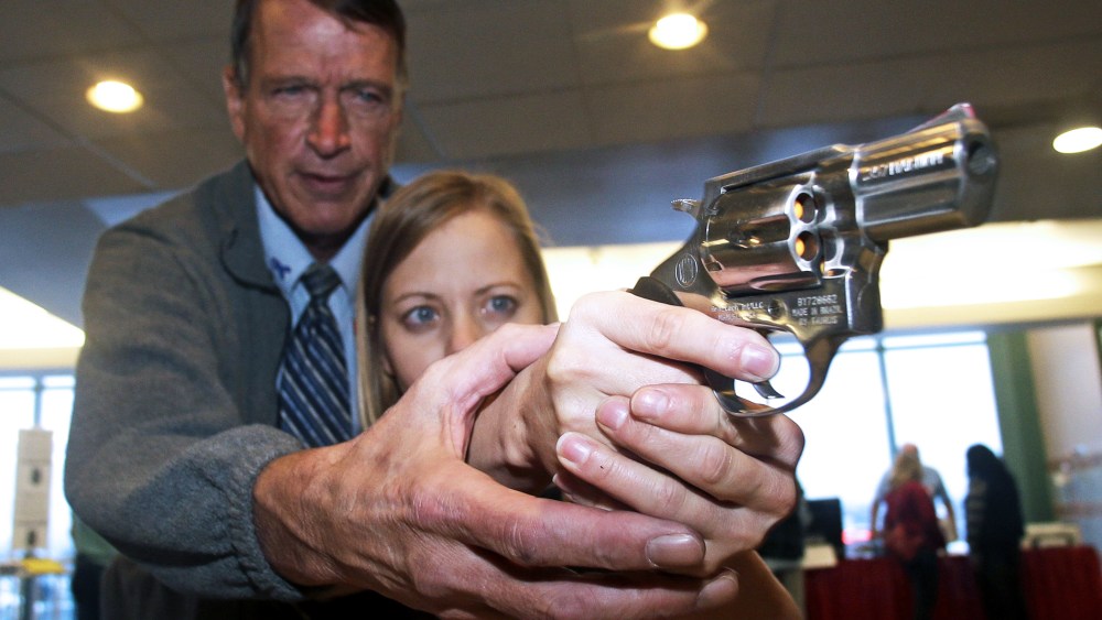 A fourth grade teacher receives instruction during a concealed weapons training for teachers in West Valley City, Utah.