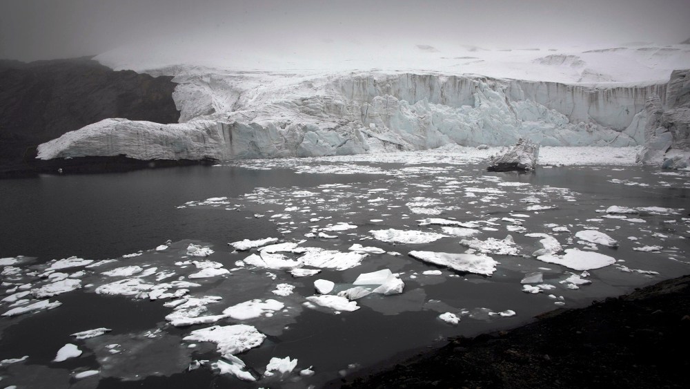 Melting blocks of ice float near the Pastoruri glacier in Huaraz, Peru, Dec. 4, 2014. (Photo by Rodrigo Abd/AP)
