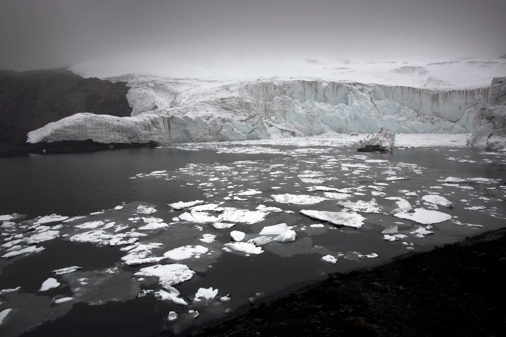 Melting blocks of ice float near the Pastoruri glacier in Huaraz, Peru, Dec. 4, 2014. (Photo by Rodrigo Abd/AP)