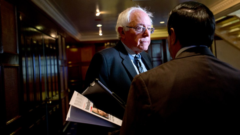 Sen. Bernie Sanders speaks to a reporter at the National Press Club in Washing on Dec. 5, 2012.