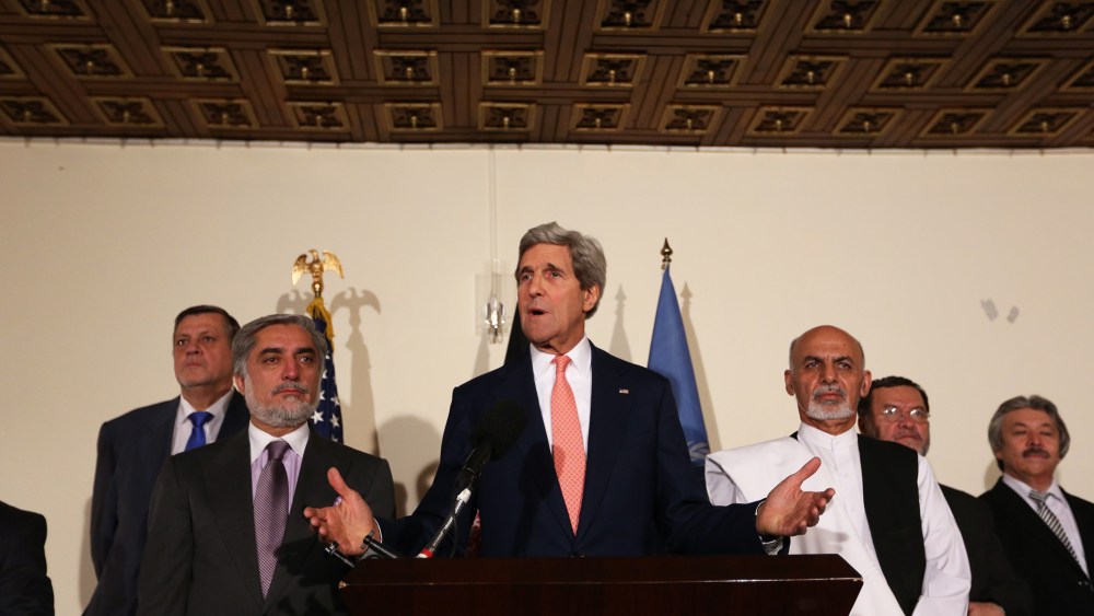 U.S. Secretary of State John Kerry, center, Afghan presidential candidate Abdullah Abdullah, left, and Afghanistan's presidential candidate Ashraf Ghani Ahmadzai, right, speaks during a joint press conference in Kabul, Afghanistan, July 12, 2014.