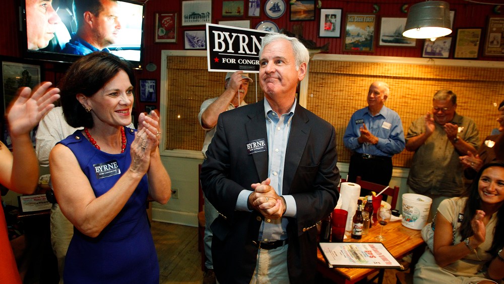 Alabamas First District congressional seat candidate Bradley Byrne greets supporters Tuesday, Sept. 24, 2013, at Ed's Seafood Shed in Spanish Fort, Ala.