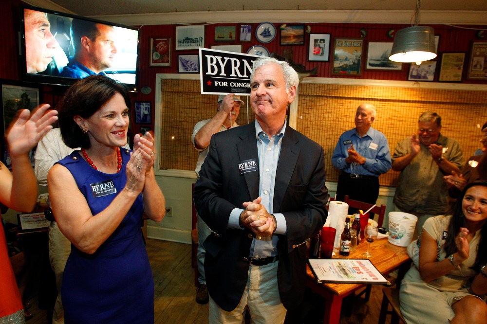 Alabamas First District congressional seat candidate Bradley Byrne greets supporters Tuesday, Sept. 24, 2013, at Ed's Seafood Shed in Spanish Fort, Ala.