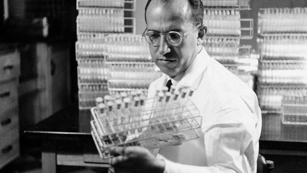 Dr. Jonas Salk, developer of the polio vaccine, is shown in his lab in Pittsburgh, Pa., Oct. 7, 1954. (Photo by AP)