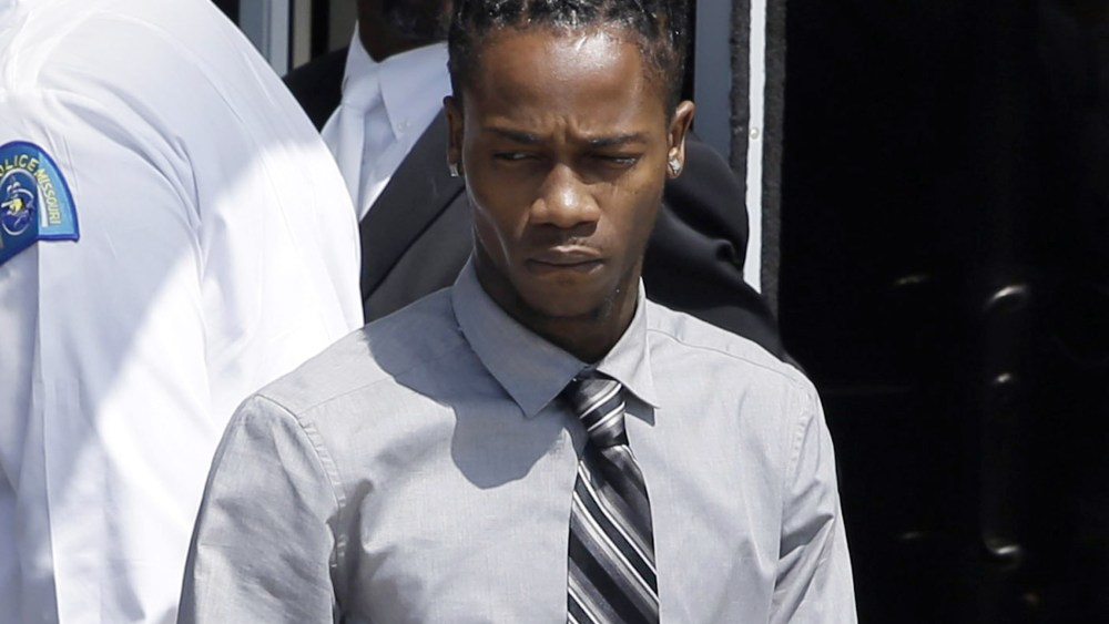 Dorian Johnson leaves Friendly Temple Missionary Baptist Church in St. Louis on Aug. 25, 2014.