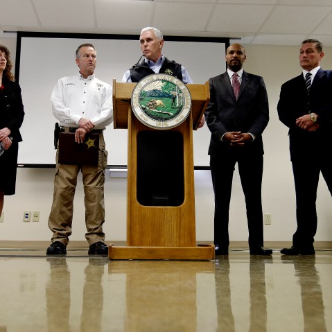 Indiana Gov. Mike Pence responds to a question during a news conference March 25, 2015, in Scottsburg, Ind. Pence held a news conference after meeting with local officials in Scott County about an HIV outbreak. (Photo by Darron Cummings/AP)
