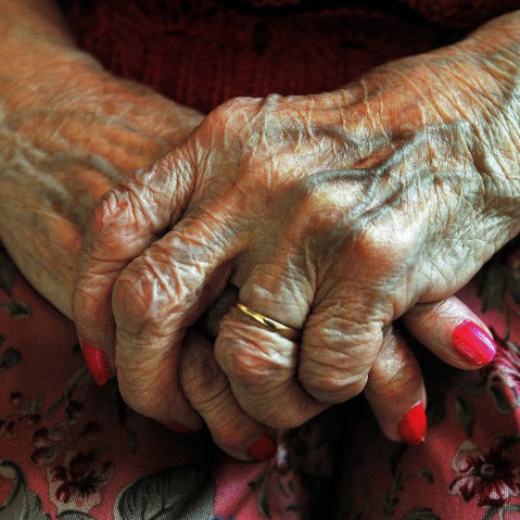 The hands of an elderly woman. (Photo by John Stillwell/PA Wire/AP)