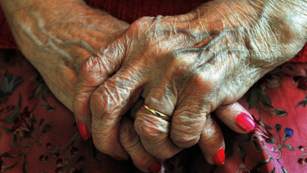 The hands of an elderly woman. (Photo by John Stillwell/PA Wire/AP)