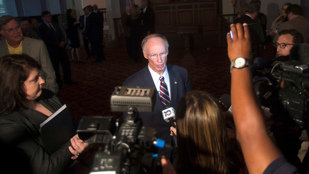 Alabama Gov. Robert Bentley speaks to the media after announcing a state settlement with BP for the 2010 oil spill in the Gulf of Mexico, July 2, 2015, at the Capitol building in Montgomery, Ala. (Photo by Albert Cesare/The Montgomery Advertiser/AP)