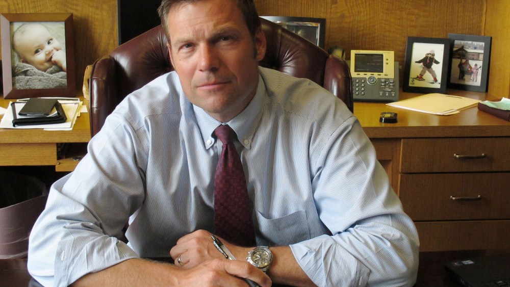 Kansas Secretary of State Kris Kobach in his Topeka, Kan., office, Aug. 1, 2013. (Photo by John Hanna/AP)