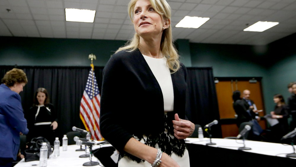 Wendy Davis speaks to reporters after an education roundtable meeting in Arlington, Texas, Jan. 9, 2014.