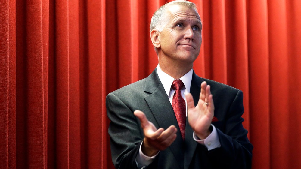 House speaker Thom Tillis applauds guests in the gallery from the House floor during the opening session of the General Assembly in Raleigh, N.C., May 14, 2014. (Photo by AP)