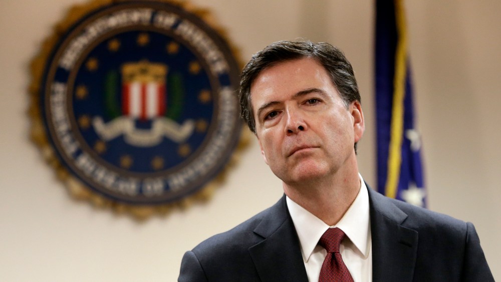FBI Director James B. Comey listens to a question from a reporter during a media conference in San Francisco, Calif., Feb. 27, 2014. (Photo by Ben Margot/AP)