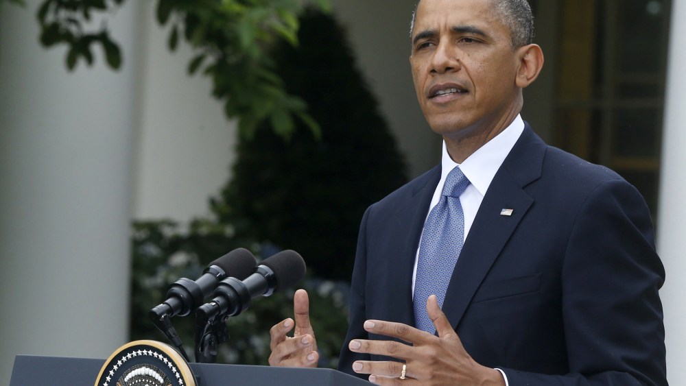 President Barack Obama gestures during the joint news conference with Turkish Prime Minister Recep Tayyip Erdogan, Thursday, May 16, 2013, in the Rose Garden of the White House in Washington. (Photo by Charles Dharapak/AP Photo)
