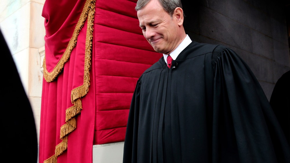 U.S. Supreme Court Chief Justice John Roberts arriving at the West Front of the U.S. Capitol in Washington, where Roberts administered the oath of office to President Barack Obama, Jan. 21, 2015. (Photo by Win McNamee/AP)