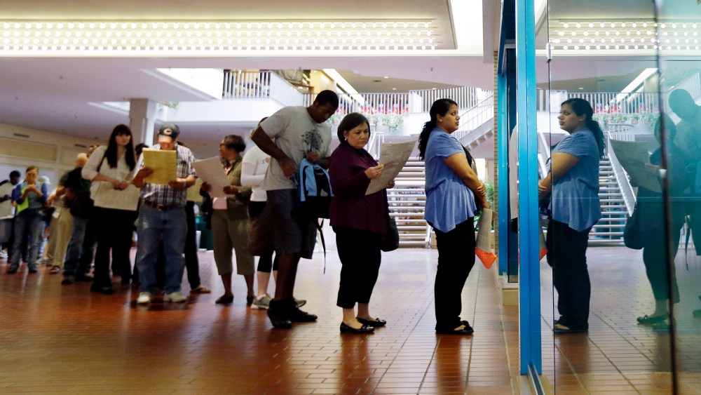 Voters wait in line at a polling place located inside a shopping mall, on Election Day on Nov. 6, 2012, in Austin, Texas. (Eric Gay/AP)