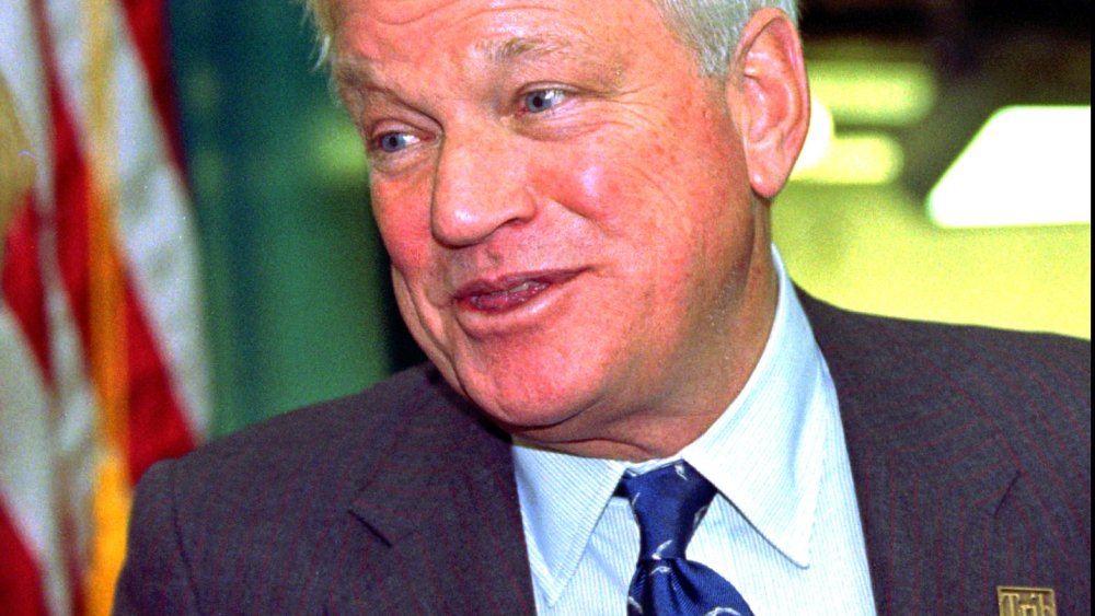 In this Oct. 23, 1997, file photo, billionaire Richard Mellon Scaife, owner and publisher of the Tribune Review newspapers in Pittsburgh and Greensburg, Pa., greets visitors as they enter the paper's new facility in Warrendale, Pa. during the dedication o
