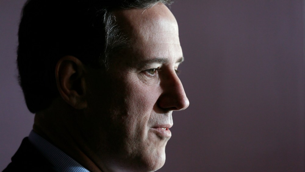 Former Penn. Senator Rick Santorum speaks during a news conference, March 26, 2014, in Johnson, Iowa.