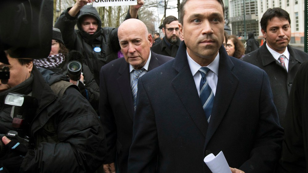 Rep. Michael Grimm leaves Federal court in Brooklyn after pleading guilty to a federal tax evasion charge rather than go to trial next month, Dec. 23, 2014, in New York. (Photo by John Minchillo/AP)