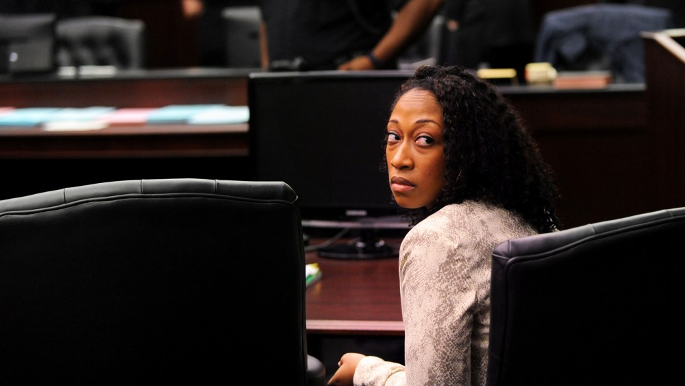 Marissa Alexander looks back to the gallery while the lawyers involved in the case have a sidebar discussion with Judge James Daniel Wednesday, April 2, 2014. (Photo by Bob Mack/The Florida Times-Union/AP)