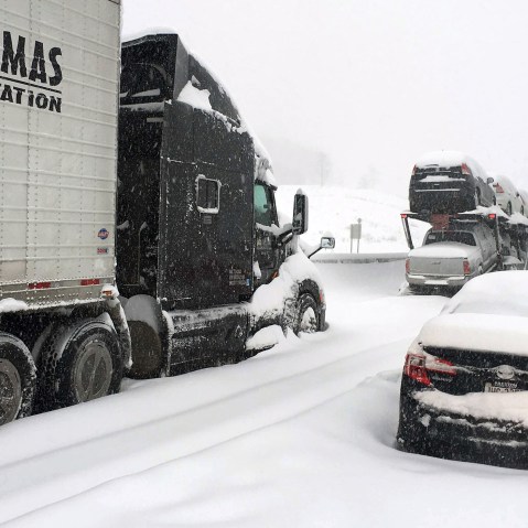In this photo provided by Michael Watkins, traffic is at a standstill on the Pennsylvania Turnpike near Bedford, Pa., Jan. 23, 2016. (Photo by Michael Watkins/AP)