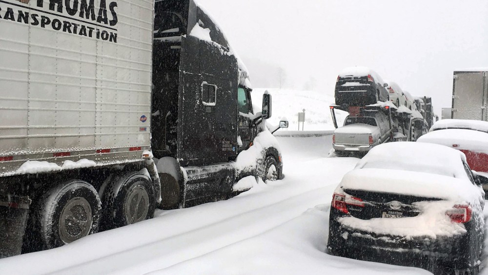 In this photo provided by Michael Watkins, traffic is at a standstill on the Pennsylvania Turnpike near Bedford, Pa., Jan. 23, 2016. (Photo by Michael Watkins/AP)