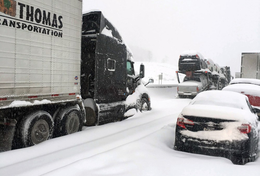 In this photo provided by Michael Watkins, traffic is at a standstill on the Pennsylvania Turnpike near Bedford, Pa., Jan. 23, 2016. (Photo by Michael Watkins/AP)