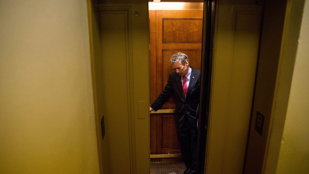 Republican presidential candidate, Sen. Rand Paul, R-Ky. departs in an elevator after speaking at a news conference on Capitol Hill in Washington, D.C., June 2, 2015. (Photo by Andrew Harnik/AP)