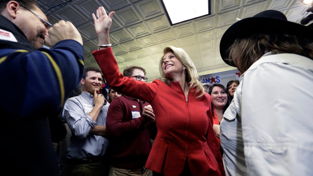 Texas Sen. Wendy Davis greats supporters at her campaign headquarters on March 4, 2014, in Fort Worth, Texas.