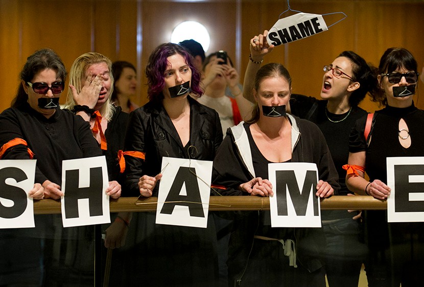Lenell Ripley, second from left, cries as she demonstrates with other abortion rights supporters outside the Capitol auditorium in Austin, Texas, Thursday July 18, 2013.   (Photo by Jay Janner/Austin American-Statesman/AP)