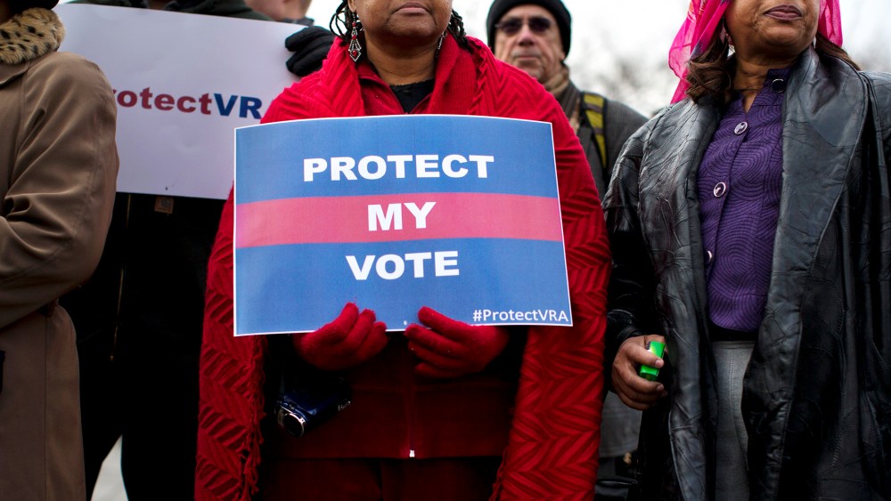 People wait in line outside the Supreme Court in Washington, Wednesday, Feb. 27, 2013, to listen to oral arguments in the Shelby County, Ala., v. Holder voting rights case.