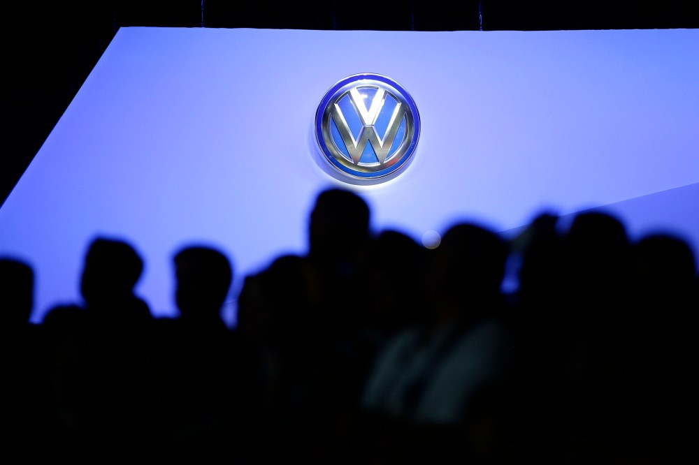 The Volkswagen logo is displayed as people gather at the Los Angeles Auto Show, Nov. 20, 2013, in Los Angeles, Calif.  (Photo by Jae C. Hong/AP)